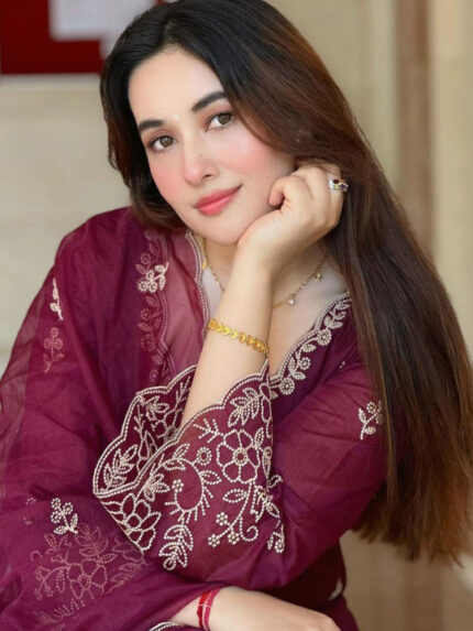 Women’s embroidered kurta set featuring ethnic motifs with thread work, paired with trousers and a matching dupatta.